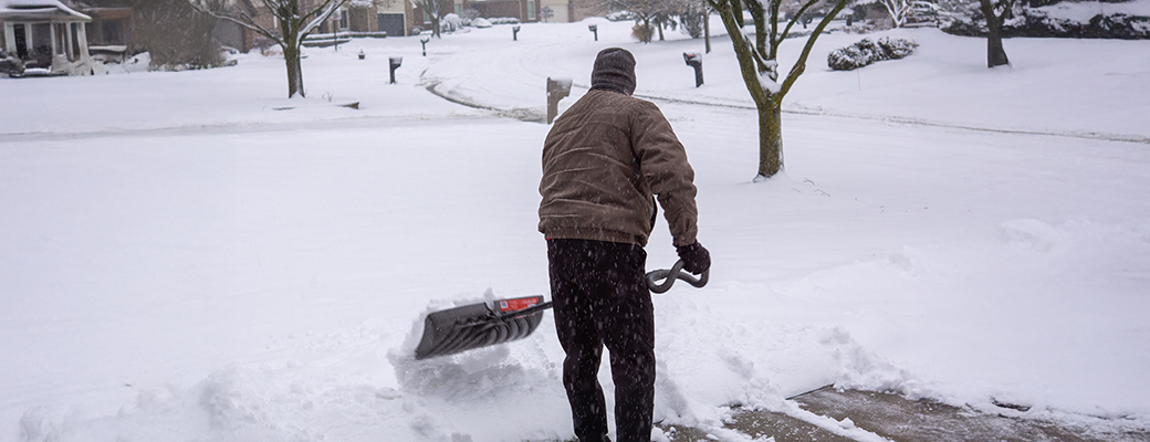Image of person shoveling snow